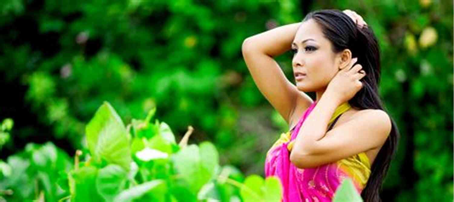 A Thai Woman Smiling And Holding The Dating Thai Women Booklet Dating Thai Women Booklet: Everything You Need To Know About Dating Thai Women