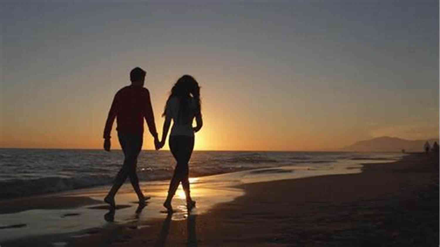 Couple Walking Hand In Hand Along Sandy Beach At Sunset In Bayshore Beach Calloway Cove: A Sweet Small Town Romance (Bayshore Beach 1)